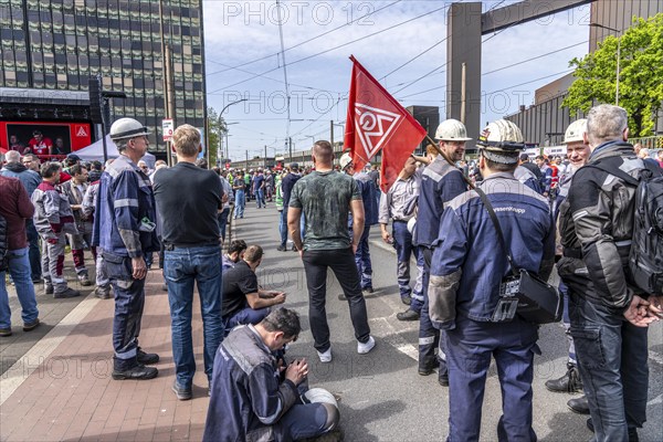 Steelworkers at a demonstration in front of the headquarters of ThyssenKrupp Steel Europe in Duisburg, against massive job cuts, after the participation of a foreign investor in the group, in the background the Oxygen steelworks, Duisburg North Rhine-Westphalia, Germany, Europe