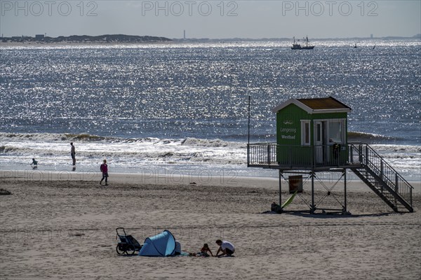 North Sea island of Langeoog, early summer, shortly after the first easing of the lockdown in the Corona crisis, still quite few tourists on the beach, DLRG watchtower, Lower Saxony, Germany, Europe