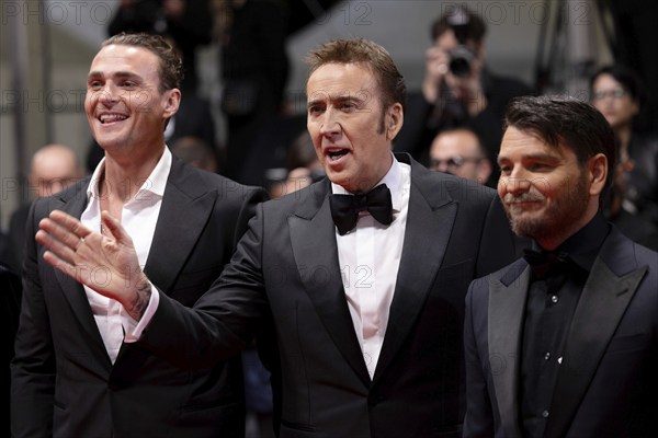 Cannes, France, 17.5.2024: Alexander Bertrand, Nicolas Cage, Justin Rosniak at the premiere of The Surfer on the red carpet of the Palais des Festivals during the 77th Cannes International Film Festival. The 77th Cannes International Film Festival will take place from 14 to 25 May 2024, Europe