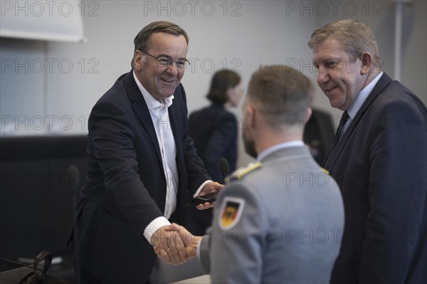 Boris Pistorius (SPD), Federal Minister of Defence greets a soldier, taken during the SPD parliamentary group meeting in Berlin, 12.03.2024