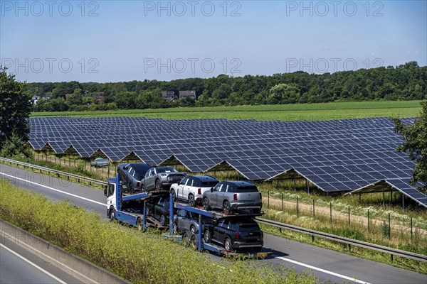 Solar park near Neukirchen-Vluyn, along the A40 motorway, over 10, 000 solar modules spread over 4.2 hectares, generating 6 million kilowatt hours per year, North Rhine-Westphalia, Germany, Europe