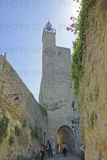 Tour de l'Horloge, clock tower and town gate with bell cage, town tower, tourists, Vaison-la-Romaine, Vaucluse, Provence, France, Europe