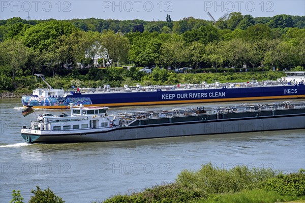 Cargo ships on the Rhine near Duisburg-Baerl, gas tanker Ineos Aloo, transporting butane gas from the ARA area (Antwerp-Rotterdam-Amsterdam) to the Ineos cracker plant in Cologne, North Rhine-Westphalia, Germany, Europe