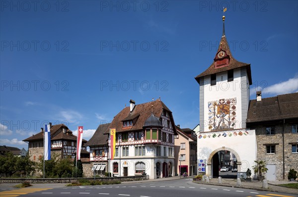 Lucerne Gate with tower clock and fresco by Seraphin Weingartner, Sempach, Canton Lucerne, Switzerland, Europe