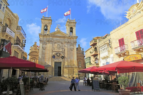 Basilica church and cafes in Saint George's square, Plaza San Gorg, Victoria Rabat, island of Gozo, Malta, Europe