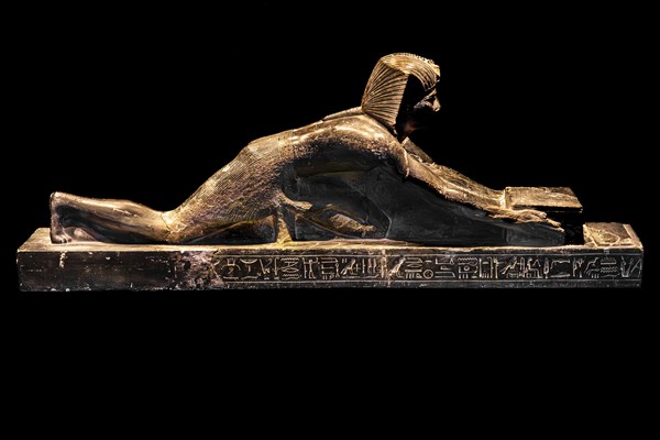 Statue of Ramses II prostrating himself from the exhibition: Ramses the Great and the Gold of the Pharaohs, Cologne, North Rhine-Westphalia, Germany, Europe