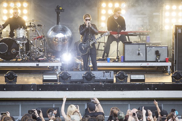 Samuel Sam Fogarino (drummer), Paul Banks (singer) and Brandon Curtis (keyboarder) of the band Interpol live at the Parkbühne Wuhlheide in Berlin on 22 June 2024