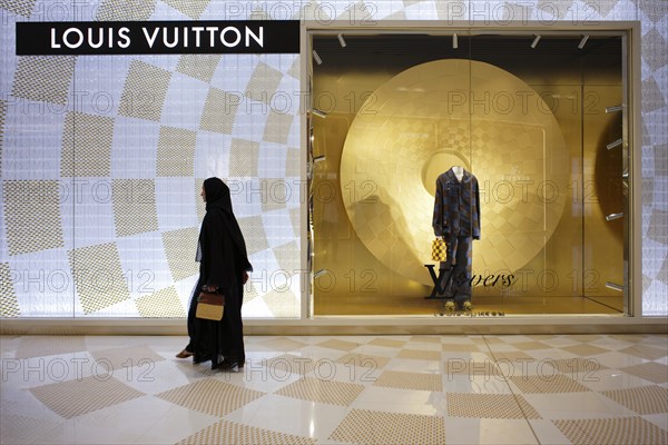 Interior, Muslim, Mulima, Woman, Veiled, LOUIS VUITTON Brand Store, Logo, Dubai Luxury Shopping Mall, Luxury Shopping Centre, Downtown, Dubai, United Arab Emirates, VAR, Asia