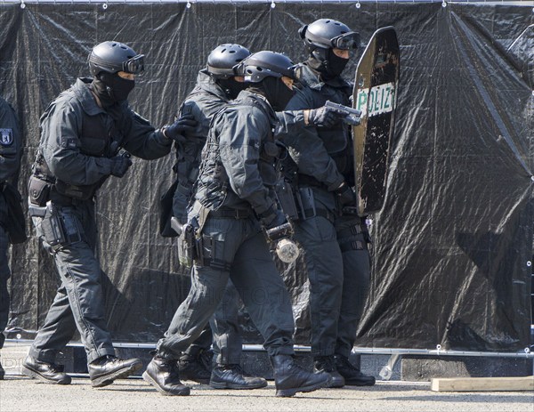 Police officers from the Berlin Special Operations Command, SEK, simulate an attack during an exercise, 11/09/2016