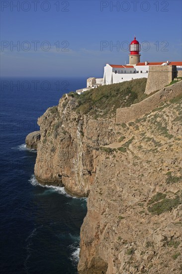 The lighthouse directly on the Cabo de Sao Vicente in the Algarve at the most south-westerly point of mainland Europe, Portugal, Europe