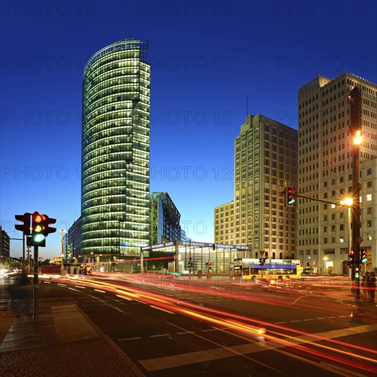 High-rise buildings at Potsdamer Platz, intersection with traffic lights and light traces of cars, night shot, Berlin, Germany, Europe