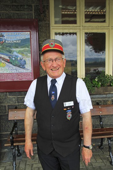 Station master at Ffestiniog and Welsh Highland Railway station, Porthmadog, Gwynedd, north west Wales, UK