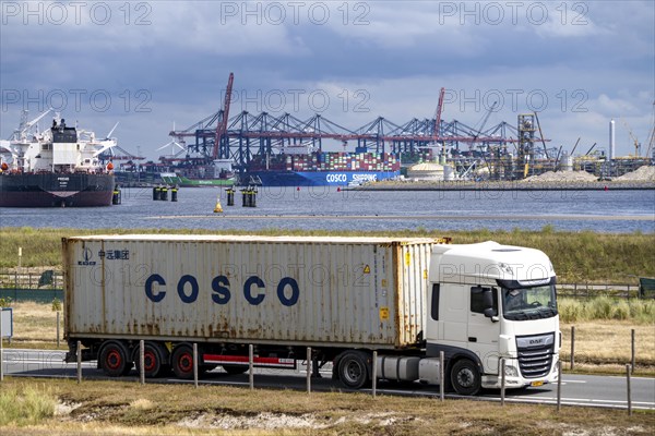 The seaport of Rotterdam, Netherlands, deep-sea port Maasvlakte 2, on a man-made land area off the original coast, Hutchison Ports ECT Euromax Terminal Rotterdam, Container Terminals, lorry has picked up containers in the port and transports them further