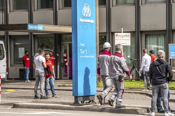 Steelworkers at a demonstration in front of the headquarters of ThyssenKrupp Steel Europe in Duisburg, against massive job cuts, after the participation of a foreign investor in the group, Tor tor 1 works council building, Duisburg North Rhine-Westphalia, Germany, Europe