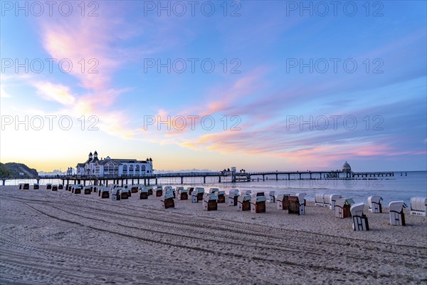 The pier of Sellin, evening mood, sunset, 394 metres long, with restaurant, jetty, beach chairs, island of Rügen, Mecklenburg-Western Pomerania, Germany, Europe