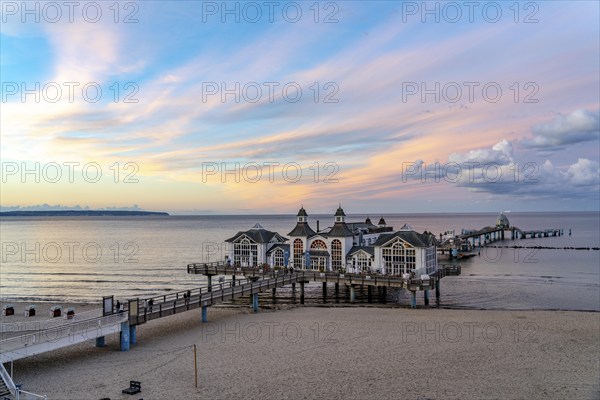 The pier of Sellin, evening mood, sunset, 394 metres long, with restaurant, jetty, beach chairs, island of Rügen, Mecklenburg-Western Pomerania, Germany, Europe