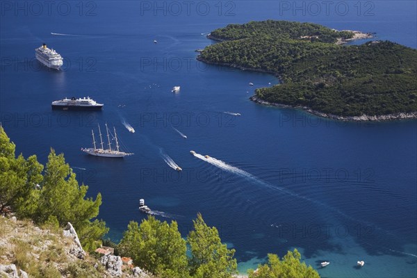 High angle view of cruise ships and sailboats on the Adriatic sea taken from Mount Srd, Dubrovnik, Dalmatia region, Croatia, Europe