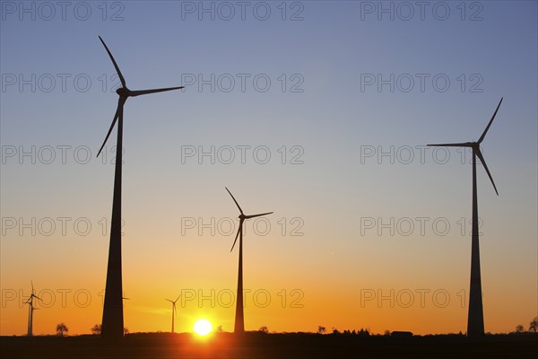 Wind turbines at sunrise, Wevelsburg wind farm, Büren, Paderborn plateau, North Rhine-Westphalia, Germany, Europe