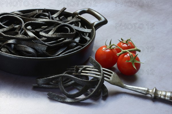 Black pasta coloured with squid ink in shell, Taglioni al Nero di Seppia, Italy, Europe