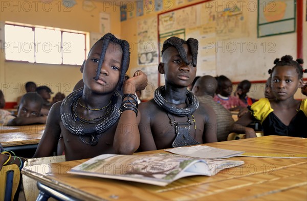 Girls, Himba pupils, sitting in a classroom at the Omohanga Primary School, Himba school, Omohanga, Kaokoland, Kunene, Namibia, Africa