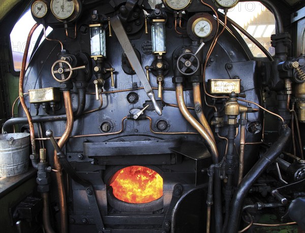 Heritage steam railway, Sheringham station, North Norfolk Railway, England, UK onboard steam engine with coal firebox