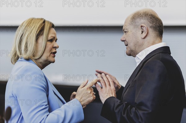 (R-L) Olaf Scholz (SPD), Federal Chancellor, and Nancy Faeser (SPD), Federal Minister of the Interior and Home Affairs, pictured in front of the parliamentary group meeting of the SPD parliamentary group in Berlin, 23 April 2024