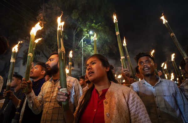 Members of the All Assam Students' Union (AASU) take part in a flaming torch rally and shout slogans to protest against the implementation of the Citizenship Amendment Act (CAA), on March 12, 2024 in Guwahati, Assam, India. The Citizenship Amendment Act (CAA), passed by the Indian Parliament in 2019, indeed grants expedited citizenship to specific religious minorities from Afghanistan, Bangladesh, and Pakistan who arrived in India on or before December 31, 2014. These religious minorities include Hindus, Sikhs, Buddhists, Jains, Parsis, and Christians, Asia