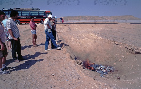 Waste is burnt in the desert, Rotel-Tours bus, passengers, waste incineration, Libyan Desert, Egypt, Africa