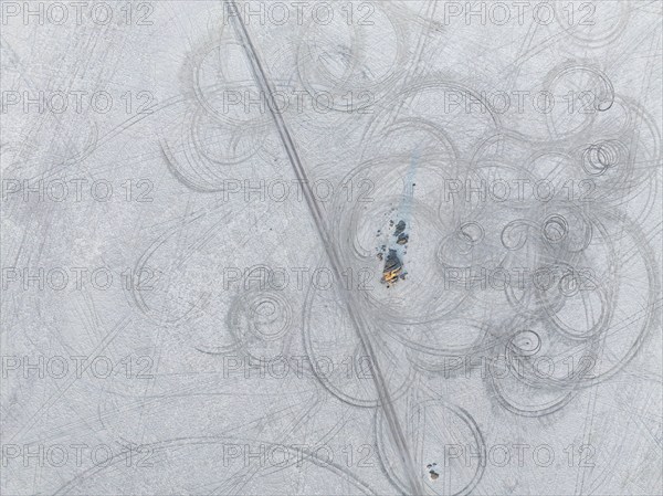 Tyre tracks in the salt pan, top-down, aerial view, Kubu Island, Botswana, Africa