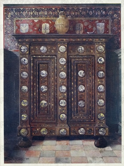 Furniture around the turn of the century 1900, Walnut cabinet with inlays and painted medallions of Delft ware (1910, 1911), Walnut kas inlaid and with painted medallions of Delft ware (1910, 1911) .jpg