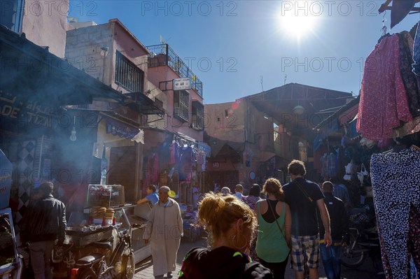 Market, atmosphere, sun, bazaar, traders, people, souk, Arabic, Orient, oriental, culture, Islam, tourism, travel, shopping, city, medina, Marrakech, Morocco, Africa