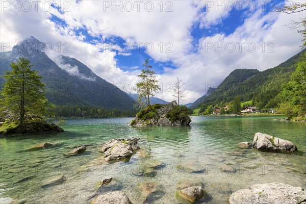 Hintersee near Ramsau with clear green water, surrounded by forests and mountains under a cloudy sky, Berchtesgaden National Park, Berchtesgadener Land, Upper Bavaria, Bavaria, Germany, Europe