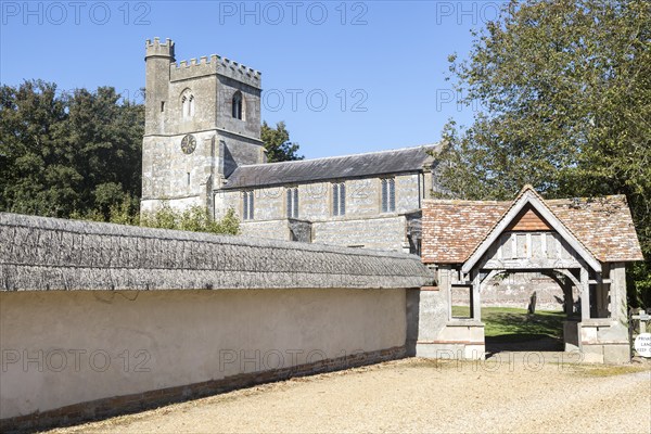 Lychgate entrance to Church of All Saints, Enford, Wiltshire, England, UK