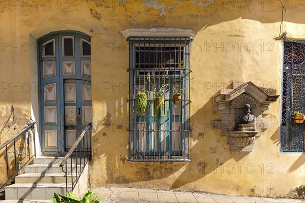 Scenic colorful Old Havana streets in historic city center (Havana Vieja) near Paseo El Prado and Capitolio