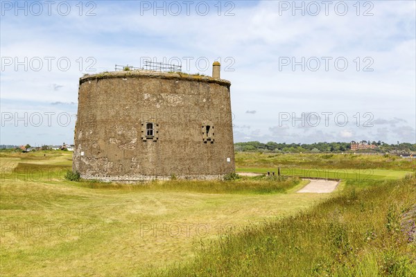 Martello Tower T 1810-1812, Napoleonic War military building on golf course, Felixstowe Ferry, Suffolk, England, UK