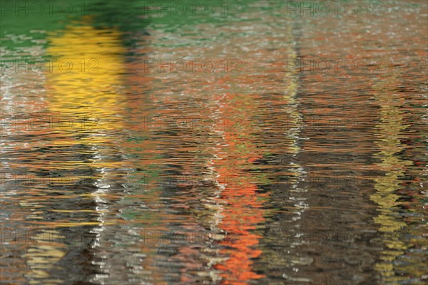 Reflection, colourful reflections on the water surface, maritime impressions, Greetsiel, North Sea, Lower Saxony, Germany, Europe