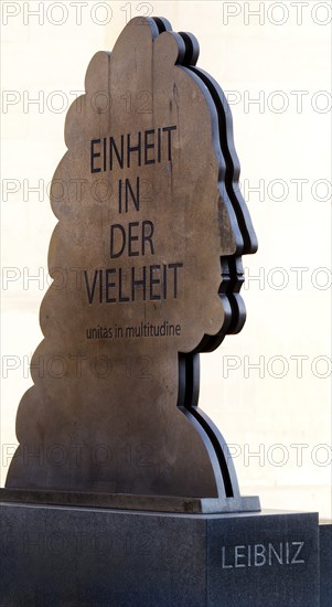 Leibniz monument as a silhouette by Stefan Schwerdtfeger with the inscription Unity in diversity, Hanover, Germany, Europe