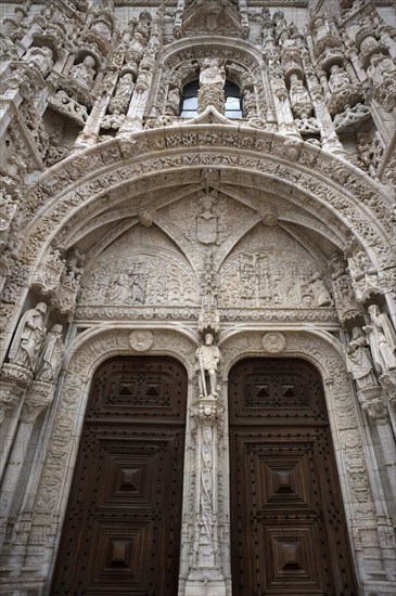 South portal, tympanum, Hieronymite monastery Mosteiro dos Jerónimos, also known as Mosteiro de Belém, Belém, Lisbon, Portugal, Europe