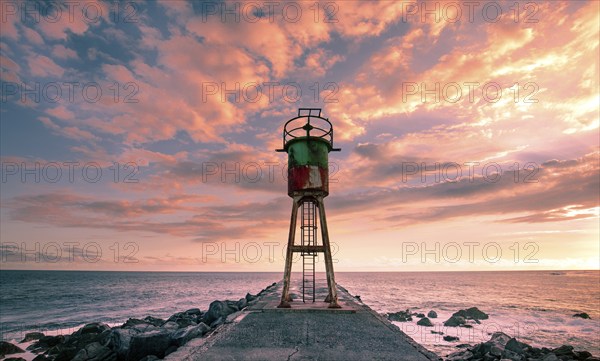 Jetty and lighthouse in Saint Pierre, La Reunion island, Indian Ocean, april 26, 2016, Saint Pierre, France, Europe