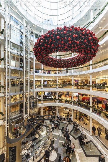 Breuninger department stores' during the Advent season, interior shot with Advent wreath. Stuttgart, Baden-Württemberg, Germany, Europe