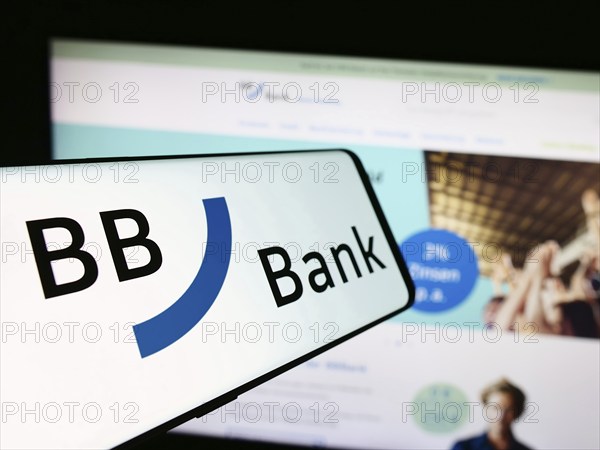 Stuttgart, Germany, 07-15-2024: Mobile phone with logo of German financial services company BBBank eG in front of business website. Focus on left of phone display, Europe