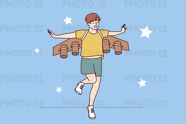 Little boy dreams of becoming pilot or astronaut and jumps in suit with airplane wings. Cheerful teenager imagines that became professional pilot and went to fly through starry sky