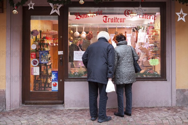 The butcher shop window at Christmas. Kaysersberg, Alsace. France