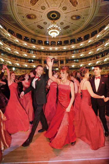 Debutantes at the Semper Opera Ball. After the tension of the opening with the Viennese Waltz, the debutantes dance exuberantly to Perter Kraus' Rockn Roll at the Semper Opera Ball 2010