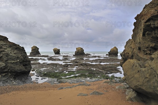 Sea stacks at the Plage des Cinq Pineaux at Saint-Hilaire-de-Riez, La Vendée, Pays de la Loire, France, Europe