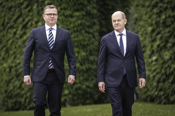 (R-L) Olaf Scholz, Federal Chancellor, receives. Petteri Orpo, Prime Minister of the Republic of Finland, with military honours at the Federal Chancellery. Berlin, 14.07.2023., Berlin, Germany, Europe