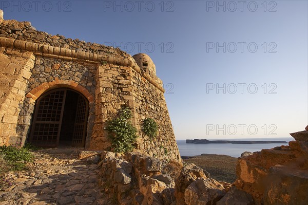 Venetian sea fortress Gramvoussa, morning light, fortress gate, fortress walls, round defence defence tower, Agria Gramvoussa island, blue cloudless sky, Gramvoussa peninsula, Pirate's Bay, Balos, Tigani, Western Crete, Crete island, Greece, Europe