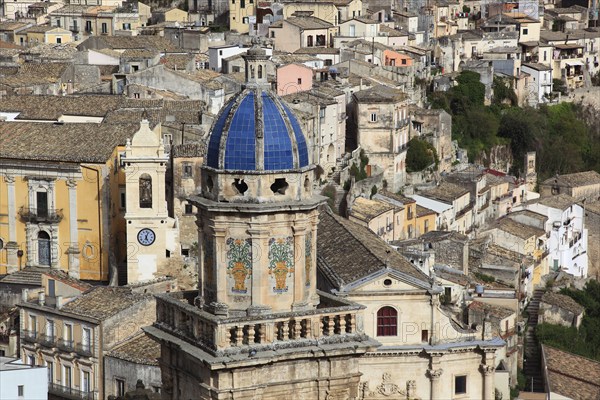 City of Ragusa, the tower of the church of Santa Maria dell Itria and houses in the district of Ragusa Superior, Sicily, Italy, Europe