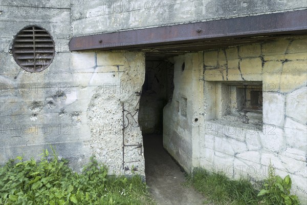 Impact of bullets on damaged casemate, artillery bunker of WWII Batterie d'Azeville Battery, part of German Atlantic Wall, Normandy, France, Europe