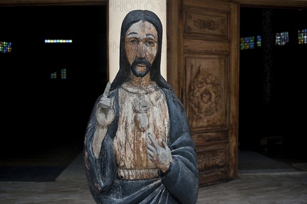 Wooden statue representing Jesus Christ at the entrance of the Saint François-Xavier church at Fadiouth Senegal